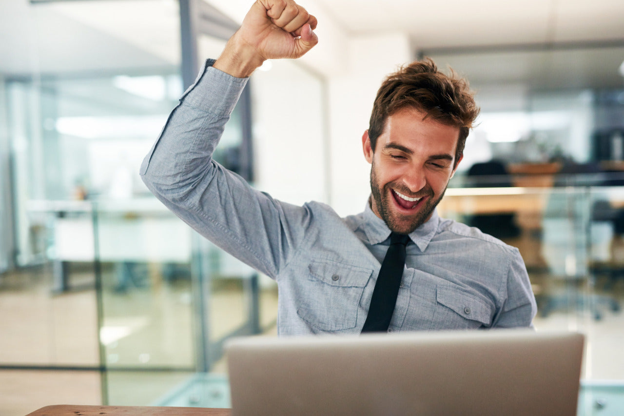 happy man on computer 